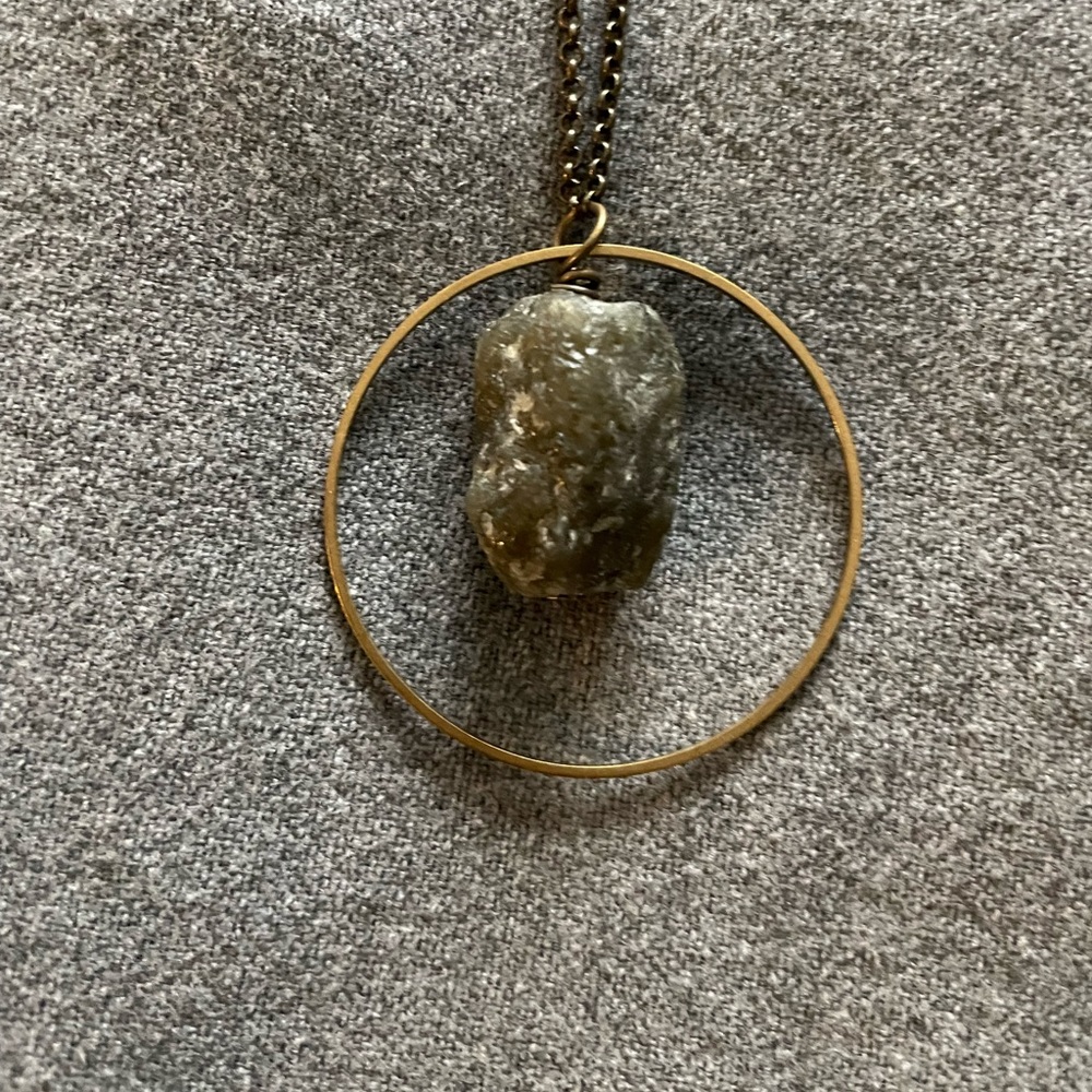36" chain necklace with simple circle showcasing a raw stone. Simple